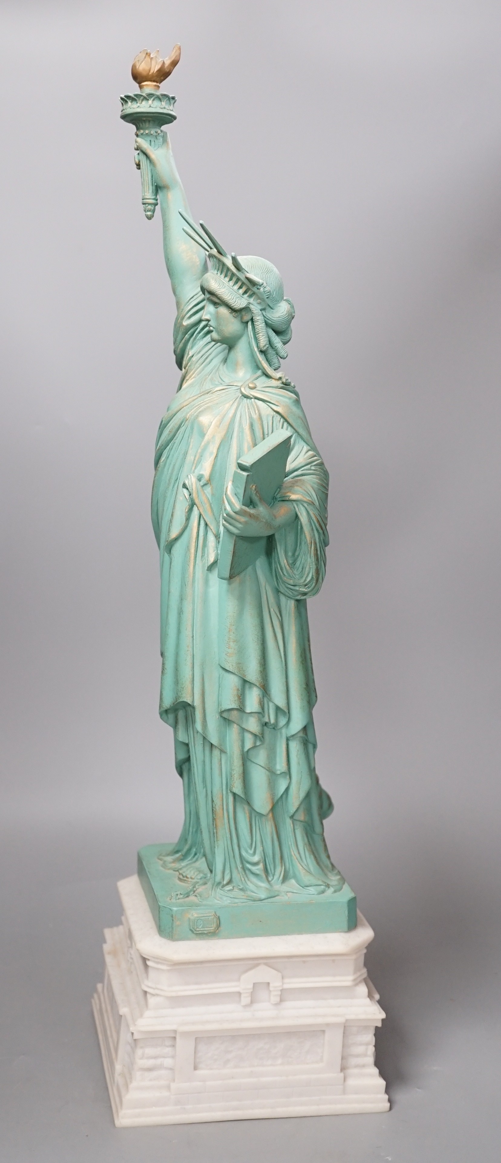 A Colbar Art Inc. bronzed resin model of the Statue of Liberty. 60cm high